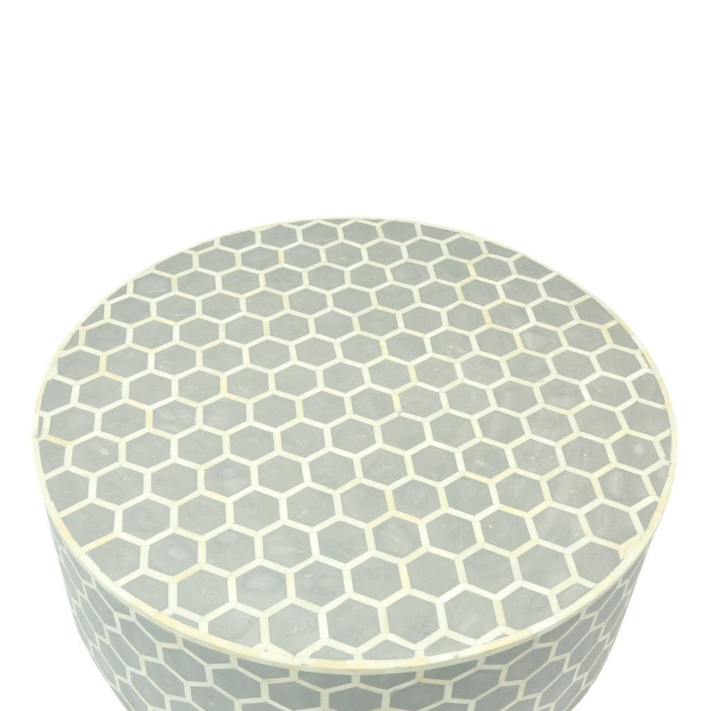 Mesa de centro redonda de nido de abeja con incrustaciones de hueso